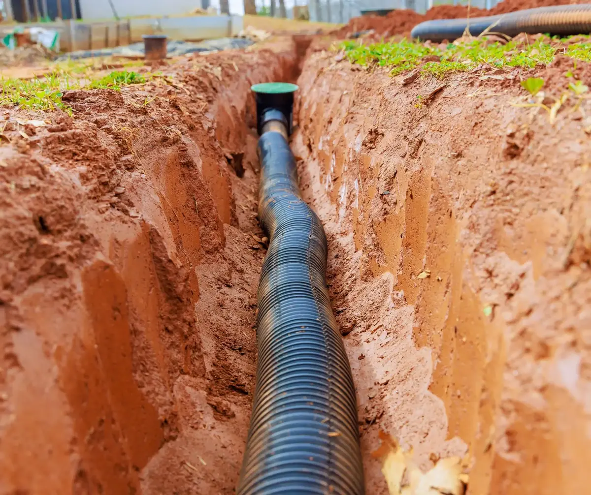 Laying underground drainage pipe systems for rainwater a stormwater