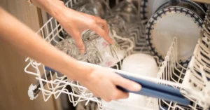 why is my dishwasher backing up into my sink