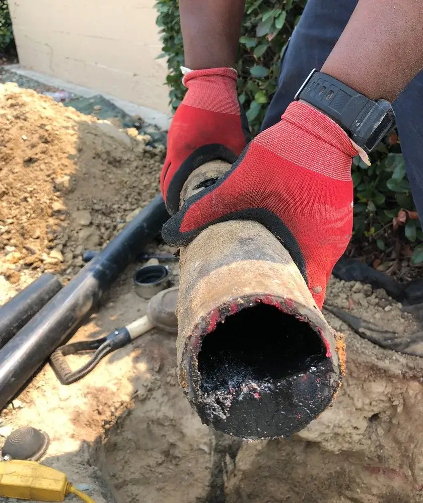 Old sewer pipe with heavy buildup and deterioration