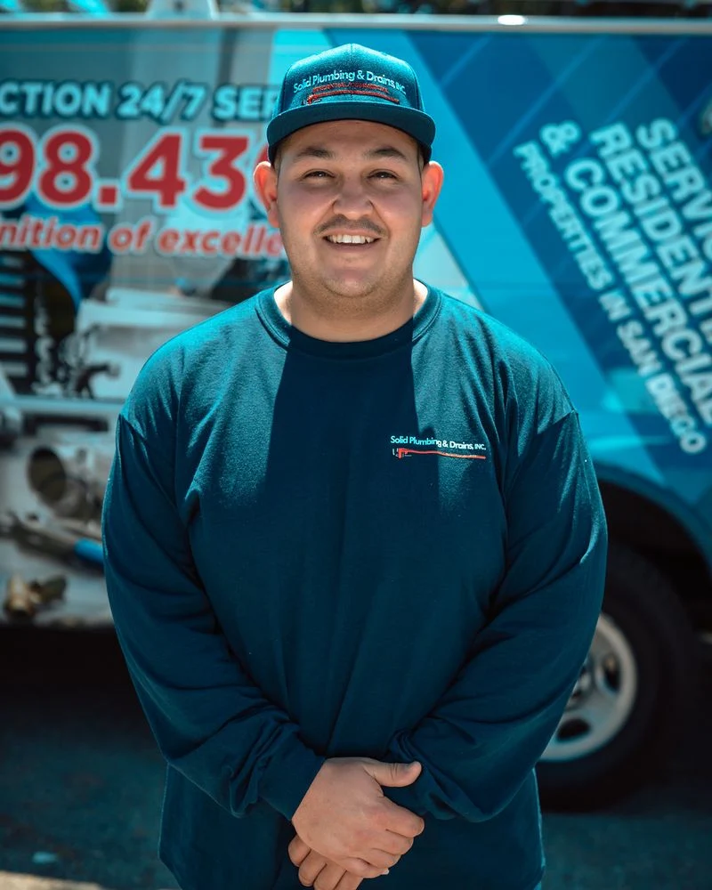 Residential plumber helping homeowners with plumbing service needs